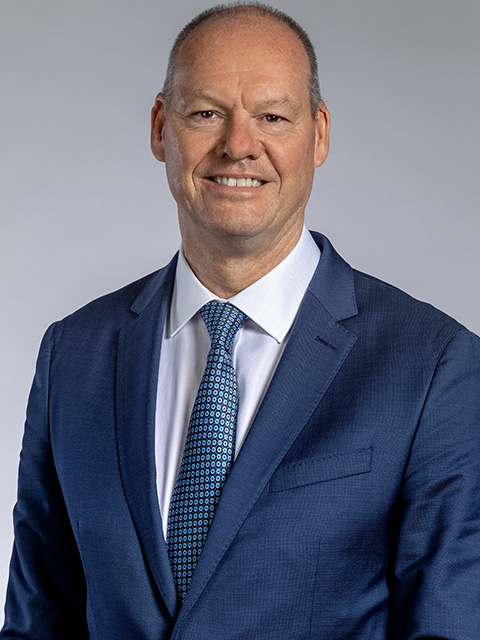 Portrait photograph of academic visitor to the School of Architecture, Building and Civil Engineering at Loughborough University, Mark Reynolds